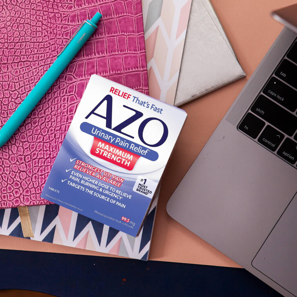 AZO Urinary Pain Relief box next to a laptop